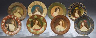 Group of Eight Different Tin Vienna Art Portrait Plates, c. 1905, each depicting a beautiful maiden, one marked "Anheuser Busch" verso, H.- 11/16 in.,