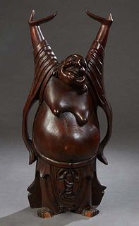 Chinese Carved Mahogany Figure of a Happy Hotei, 20th c., with raised arms. H.- 30 in., W.- 14 1/2 in., D.- 10 in.