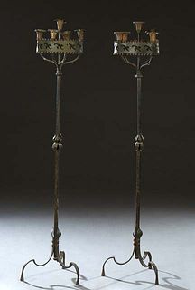 Pair of Wrought Iron Five Light Floor Candelabra, with brass bobeches within a circular pierced iron shade, on tripodal splayed legs, H.- 57 in., Dia.