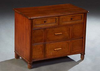 Diminutive English Carved Mahogany Low Sidelock Chest, late 19th c., the ogee edge rounded corner top over two frieze drawers above two deep drawers, 