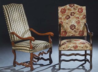 Near Pair of French Carved Walnut Fauteuils a la Reine, 20th c., the canted arched high upholstered back over scrolled arms flanking an upholstered se