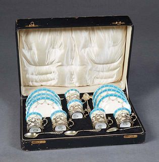 Cased Eighteen Piece Royal Worcester Demitasse Set, c. 1902, # 6060, consisting of six cups, and six saucers, with gilt edges and heavenly blue bandin