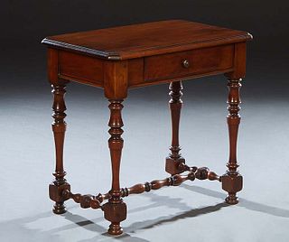 French Louis XIV Style Carved Cherry Lamp Table, early 20th c., the stepped canted corner top over a frieze drawer, on turned tapered and block legs, 