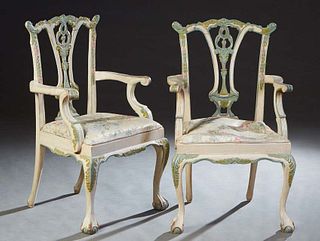 Pair of Polychromed beech Chippendale Style Armchairs, 20th c., the serpentine back over a pierced vertical splat flanked by curved scrolled arms, abo