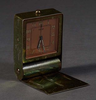 Jaeger Folding Brass Travel Alarm Clock, 20th c., with a bronzed face, and luminous hands and chapter marks, working, H.- 2 1/4 in., W.- 2 1/4 in., D.