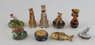 Group of Nine Hand Painted Limoges Porcelain Trinket Boxes, 20th c., one Limoges with a leopard on the lid; one Artoria with a cockatoo; one Rochard w
