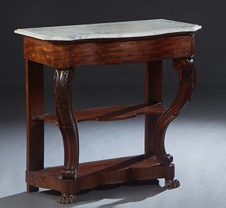 French Carved Walnut Marble Top Console Table, c. 1870, the ogee edge bowed figured white marble, over a conforming frieze drawer, on canted reeded ca