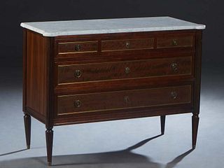 French Louis XVI Style Carved Walnut Marble Top Commode, 20th c., the ogee edge figured white cookie corner marble, over a long setback frieze drawer 