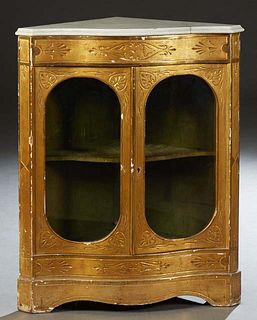 French Gilt Incised Marble Top Corner Cabinet, 19th c., the ogee edge white marble over double oval glazed doors, on a stepped plinth base, H.- 36 1/2