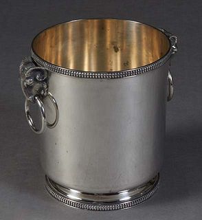 Silver Plate Champagne Bucket with Ram's Head Ring Handles, 20th c., possibly Christofle, with a beaded rim and foot, H.- 7 7/8 in., W.- 9 in., D.- 6 