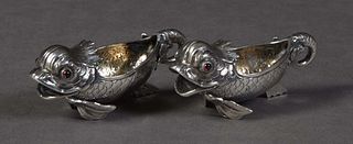 Pair of Unusual Russian Dolphin Fish Form Salts, 19th c., Moscow, with cabochon garnet eyes, hallmarked on the lower fin, H.- 1 1/2 in., W.- 3 1/2 in.