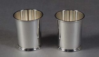 Pair of Fisher Sterling Julep Cups, 20th c., #87, of tapering form with stepped rims and feet, one engraved "RME," H.- 3 5/8 in., Dia.- 3 1/8 in., Wt.