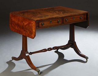 English Regency Style Inlaid Mahogany Drop Leaf Sofa Table, late 19th c., the pentagonal drop leaves over two end frieze drawers, on trestle supports 