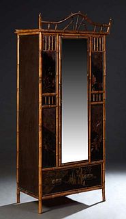 Anglo Chinese Bamboo and Lacquer Armoire, early 20th c., the arched bent bamboo crown over a central mirror door, flanked by bamboo mounted lacquered 