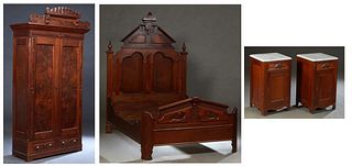 American Eastlake Assembled Three Piece Carved Walnut Bedroom Suite, c. 1880, consisting of a highback double bed with an incised peaked headboard to 