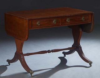English Inlaid Mahogany Drop Leaf Sofa Table, 20th c., the stepped edge top over two frieze drawers flanked by curved leaves, on reeded trestle suppor