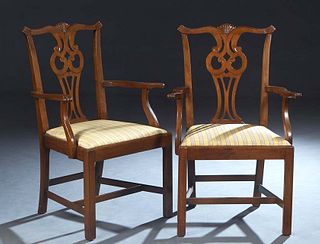 Pair of Carved Mahogany Country Chippendale Style Armchairs, 20th c., the serpentine crestrail over a pierced vertical back splat, to curved reeded ar