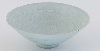 Chinese Celadon Porcelain Circular Footed Bowl, 20th c., the interior with "incised" floral decoration, H.- 2 7/8 in., Dia.- 8 1/2 in.