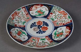 Large Japanese Imari Porcelain Charger, late 19th c., with floral and bird reserve panels around a floral center reserve, H.- 2 1/4 in., Dia.- 16 in. 