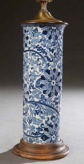 Chinese Blue and White Porcelain Cylinder Vase, 19th c., with blue and white floral decoration, now on a carved hardwood base and wired as a lamp, H.-