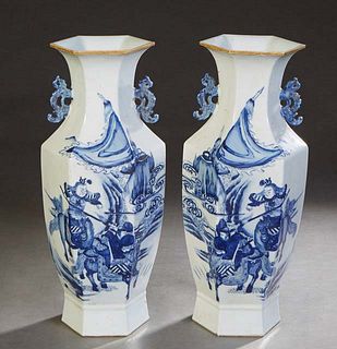 Pair of Chinese Blue and White Porcelain Baluster Hexagonal Handled Vases, 20th c., with figural decoration of men on horseback, H.- 17 1/2 in., Dia.-