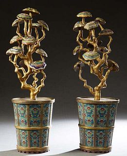A Rare Pair of Imperial Cloisonne and Enamel Lingzhi Fungus Jardinieres, the underside with the raised Qianlong mark, the lids removable for use as ja