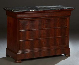 French Louis Philippe Carved Walnut Marble Top Commode, c. 1860, the rounded corner highly figured reeded edge black marble over a cavetto frieze draw
