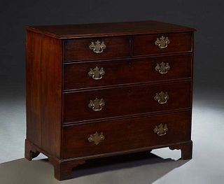 English Georgian Mahogany Chest, 19th c., the stepped ogee edge top over two frieze drawers and three graduated deep drawers, on a plinth base on brac