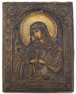 Russian Icon of the Virgin and Child, 19th c., with a brass oklad, she holds the child Jesus in her arms, H.- 7 in., W.- 5 5/8 in. Provenance: The Est