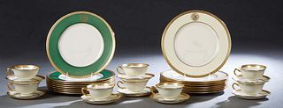 Thirty-Two Piece Lenox Porcelain Dinner Service, 20th c. in the "Madison" pattern, consisting of 8 cups, 8 saucers, 8 green bordered dinner plates, an