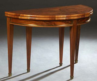 French Provincial Carved Oak Writing Table, late 19th c., the lifting lid top over a deep relief carved skirt, on turned tapered legs, H.- 31 1/2 in.,