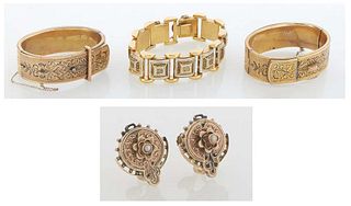 Four Pieces of Victorian Style Gold Filled Jewelry, consisting of a pair of hinged bangle bracelets, 20th c., with incised decoration; a gold filled l
