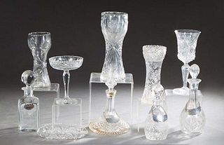 Group of Ten Pieces of Miscellaneous Crystal, 20th c., consisting of an oval shallow bowl, four decanters and stoppers with four Stieff pewter alcohol