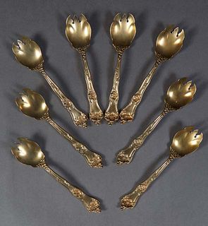 Set of Eight Gilt Washed Oyster Forks, 20th c., by Reed & Barton, in the "Nectarine" pattern, Wt.- 7.8 Troy Oz. Provenance: Property from a Gentleman 