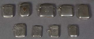 Group of Nine English Sterling Match Safes, 20th c., Tallest- H.- 1 7/8 in., W.- 2 in., D.- 7/16 in. Wt.- 6.6 Troy Oz. Provenance: British Antiques, M