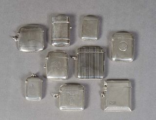 Group of Nine English Sterling Match Safes, 20th c., Largest- H.- 2 1/8 in., W.- 1 3/4 in., Wt.- 8.15 Troy Oz. Provenance: British Antiques, Magazine 