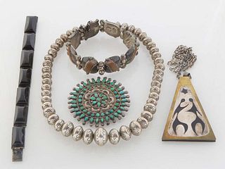 Five Pieces of Mexican Sterling Jewelry, 20th c., consisting of a turquoise mounted circular brooch, a Spratling copper and silver link bracelet with 
