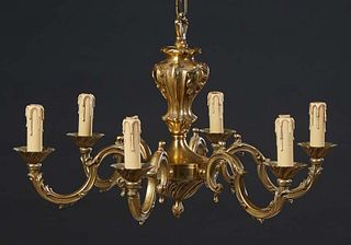 French Louis XV Style Gilt Bronze Six Light Chandelier, early 20th c., the curved arms with floriform bobeches with faux candle light sockets, H.- 16 