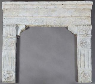 Cast Stone Fireplace Mantel, 20th c., with a stepped top over relief supports, H.- 45 in., W.- 51 in., D.- 9 1/2 in., Opening- H.- 34 in., W.- 35 3/4 
