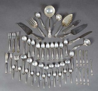 Fifty-One Pieces of Assorted Sterling Flatware, consisting of 9 Manchester butter knives; 6 Manchester cream soup spoons; a Wood & Hughes pie slice; 3
