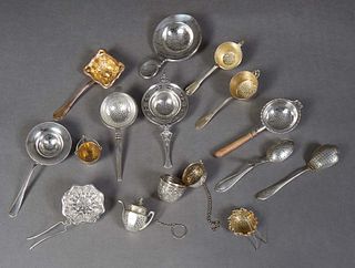 Group of Silver Tea Infusers, 19th c., consisting of a German .800 silver tea ball; a silver kettle form tea ball; a Sheffield tea infuser spoon; a st