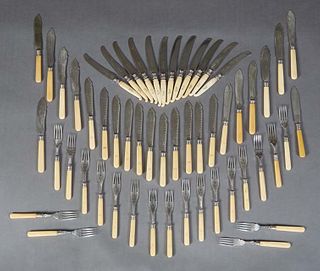 Group of Fifty-five English Ivory Handled Cutlery, 19th c., consisting of twelve cake knives by Frary, Landers and Clark; a fish set with twelve knive