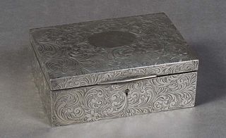 Sterling Hinged Box, 20th c., with scroll engraving on the domed top and sides, with a maker's mark of AK, Sterling and #711, lined in cardboard, H.- 