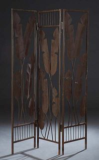 Wrought iron Three Panel Hinged Folding Room Divider, 20th c., with a spindled top over large leaf decoration, and a spindled bottom panel, H.- 72 1/2