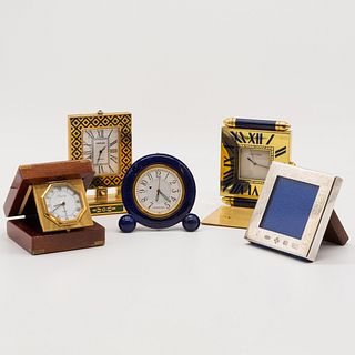 Group of Four Small Desk and Travel Clocks and a Silver Frame