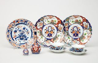 Pair of Chinese Porcelain Cups and Stands, a Pair of Japanese Imari Lobed Plates, a Chinese Imari Plate, and Two Miniature Bottle Vases