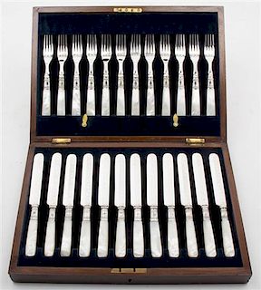 * A Silver-Plate and Mother-of-Pearl Flatware Set Length of knife 8 1/4 inches