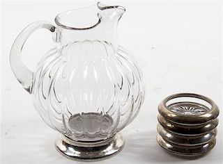 * An American Silver-Mounted Glass Pitcher and Four Silver-Mounted Glass Coasters, M. Fred Hirsch Co., Jersey City, NJ / Frank M
