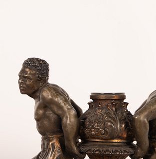 Candlestick in Bronze representing two Slaves, French school of the 19th century