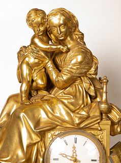 Clock in gilt bronze, with motif of Virgin with Child, French school of the 19th century, Charles X period